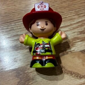 Child-Friendly Firefighter Action Figure in Red and Yellow